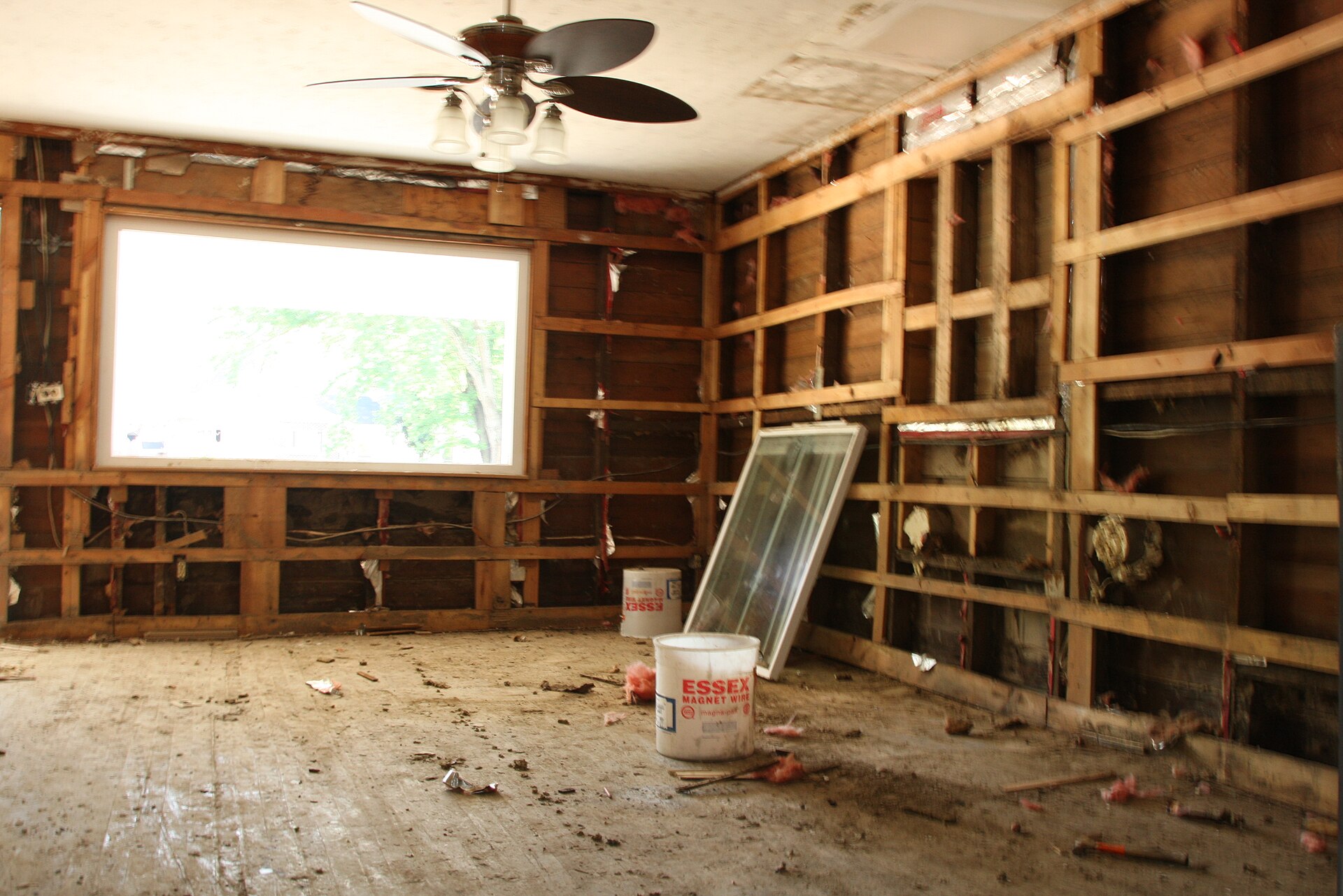 A home undergoing repairs after damage