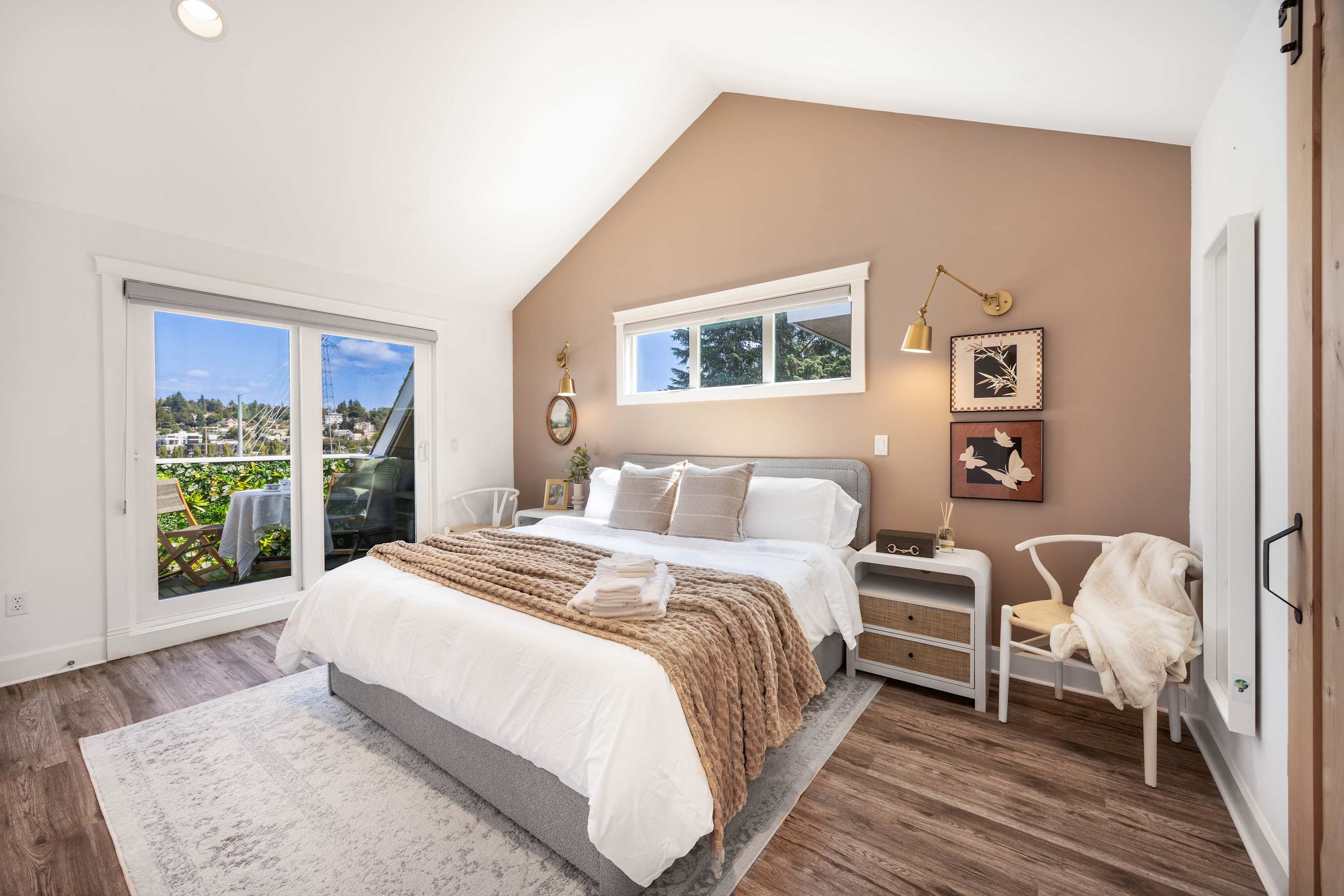 Primary bedroom with balcony
